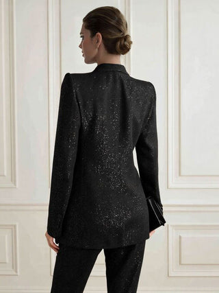 Veste blazer femme noire à sequins, vue de dos, épaules structurées, coupe ajustée.