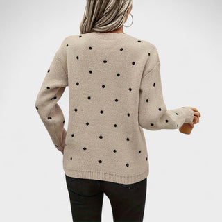 Pull en maille à pois, col rond, vue dos, beige clair et pois noirs.