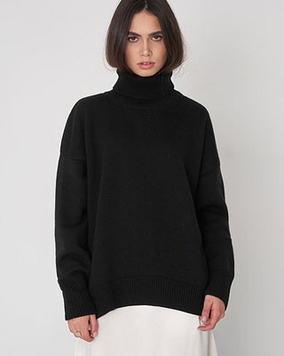 Blouse en tricot surdimensionnée noire à col montant côtelé, manches longues