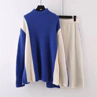 Ensemble jupe et blouse bleu avec contrastes écru, col montant côtelé, jupe mi-longue.