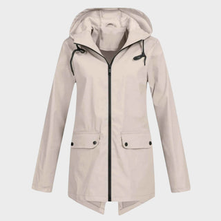 Manteau imperméable à capuche beige clair, fermeture zippée et poches plaquées