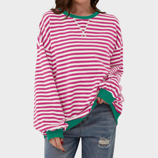 Pull à manches longues rayé rose et blanc, encolure en V, poignets verts