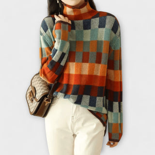 Pull à col rond en maille à carreaux colorés, coupe ample, manches longues.
