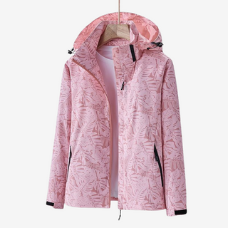 Veste coupe-vent imperméable à capuche, rose à imprimé feuilles, fermeture zippée.