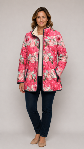 Veste matelassée ASTRID™ rose à imprimé floral, liseré noir, fermeture zippée