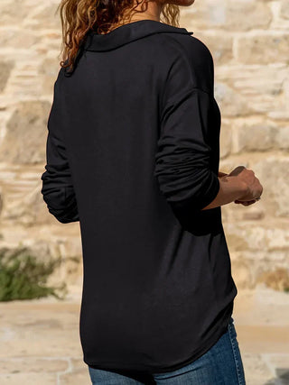 Pull femme mi-long noir, vue dos, manches longues, col zippé demi-zip