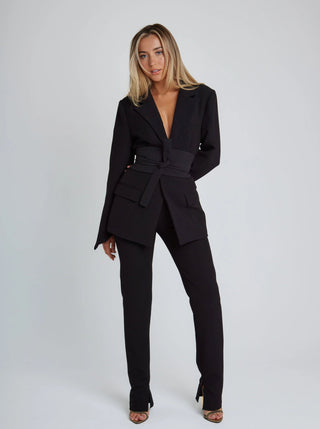 Blazer femme à taille ceinturée et coupe structurée