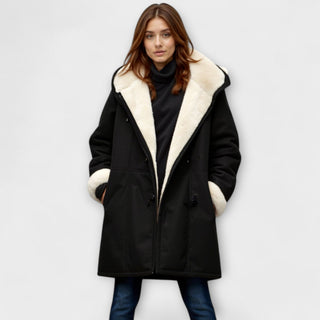 Manteau noir à col en fourrure synthétique, doublure claire, fermeture boutonnée