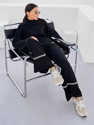 Ensemble Kendall noir : blouse oversize et pantalon long à bandes contrastées, style détente.