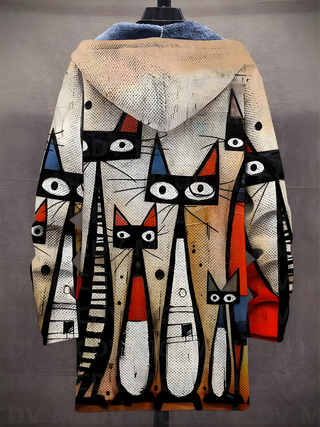 Sweat à capuche zippé motif chat abstrait tons blanc, noir et rouge, capuche bleutée.