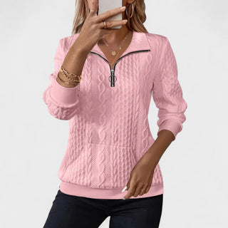 Pull à manches longues rose texturé, demi-zip à anneau et col montant.