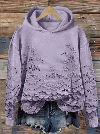 Sweat à capuche mauve, broderie florale et ourlet festonné