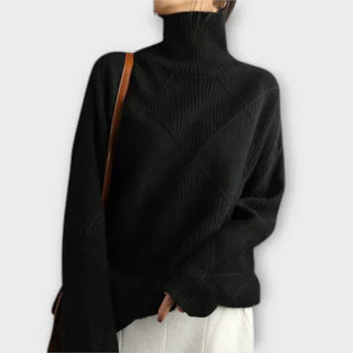 Pull à col haut confortable en maille côtelée noire, motif losanges croisés
