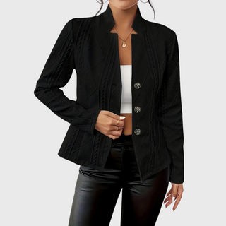 Manteau léger noir à texture chevrons, col ouvert, boutons pression sur le devant