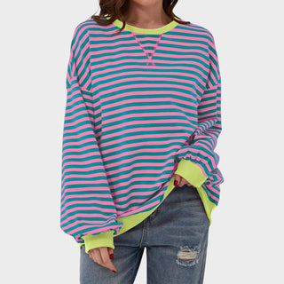 Pull décontracté rayé vert et rose, encolure en V, manches longues, coupe ample.