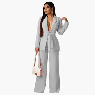 Ensemble femme tailleur avec blazer ceinturé et pantalon large