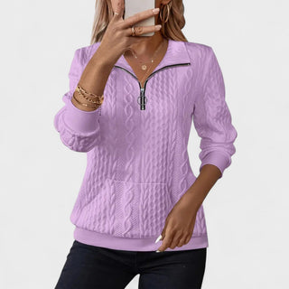 Pull à manches longues violet texturé, demi-zip à anneau et col montant.