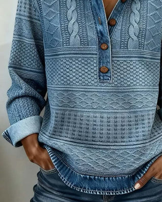 Pull manches longues bleu à demi-boutonnage, col chemise et motifs texturés