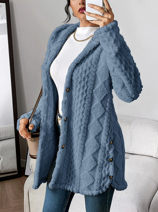 Cardigan femme bleu nuit en tissu bouclé à capuche, boutonnage sur l’avant