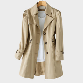 Manteau en gabardine vintage beige clair, col à revers, boutonnage double, ceinture.