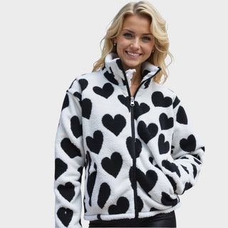 Veste réversible Manuela en polaire blanche à cœurs noirs, fermeture zippée