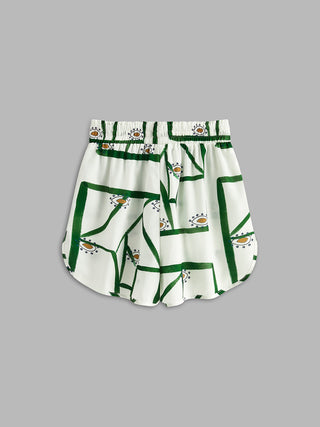 Short court imprimé vert sur fond blanc, vue dos, taille élastique avec cordon
