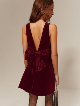 Katrina | Robe courte en velours avec décolleté dos plongeant et grand nœud