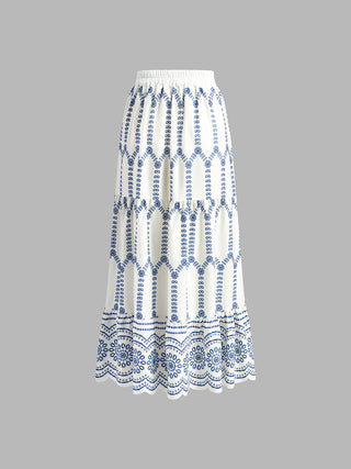 Jupe maxi en lin blanche et broderie bleue, volants d’ourlet dentelé