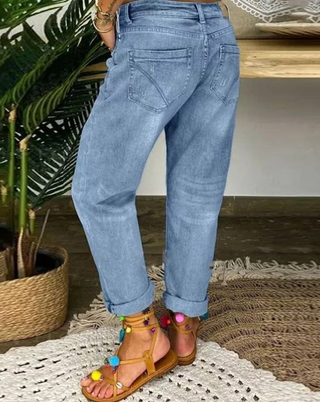 Jean femme coupe décontractée taille haute avec boutons visibles