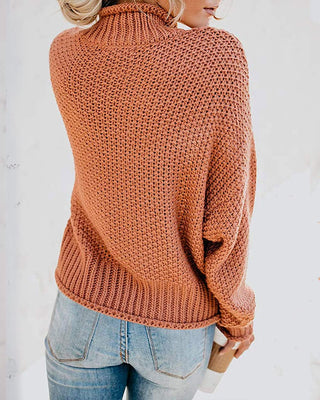 Pull en tricot épais orange vu de dos, col montant côtelé, manches longues, coupe ample