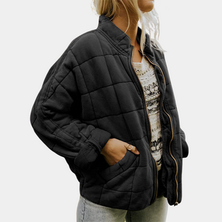 Manteau matelassé noir à fermeture éclair, col montant et poches latérales
