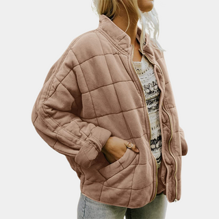 Manteau matelassé beige rosé à fermeture éclair, col montant et poches latérales