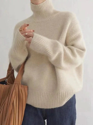 Pull en cachemire beige à col haut, manches longues, poignets et encolure côtelés