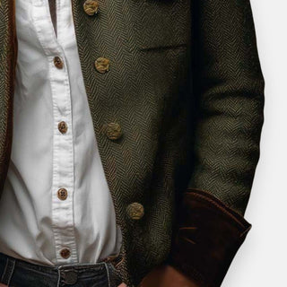 Veste tweed vert foncé : boutons dorés et texture chevrons, poche à rabat