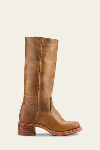 Bottes mi-mollet en cuir brun, bout fermé, talon bloc carré, tige légèrement patinée.