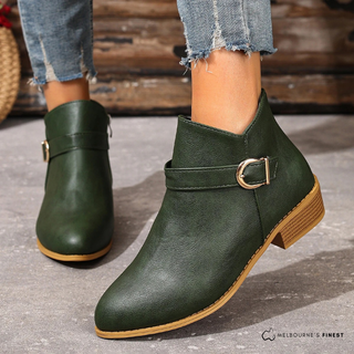 Boots mi-mollet vert foncé en cuir avec bride et boucle métal