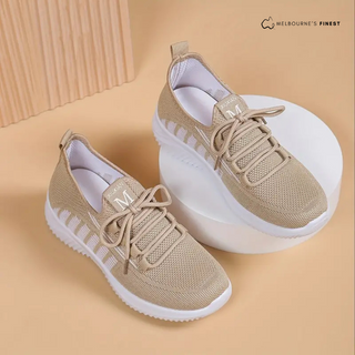 Chaussures orthopédiques beiges à lacets, semelle blanche, empeigne en maille