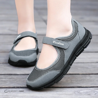 Chaussures orthopédiques grises à bride, dessus en maille, semelle épaisse à rainures