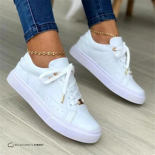 Chaussures basses à lacets blanches, motif discret, semelle blanche