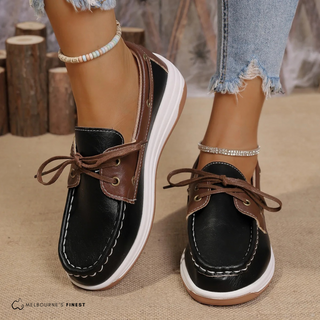Chaussures orthopédiques Eden™ pour femmes bicolores marron et noir, lacets, semelle blanche.