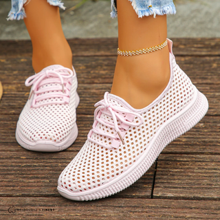 Chaussures Senna™ roses à tige ajourée et lacets, semelle texturée.