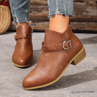 Boots mi-mollet marron en cuir avec bride et boucle métal