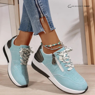 Chaussures orthopédiques femme bleu clair à lacets, bout perforé et semelle blanche