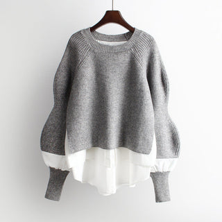 Pull gris en maille, encolure ronde et manches bouffantes, coupe ample