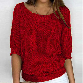 Pull à maille confortable rouge, encolure ronde, manches trois-quarts, bord côte