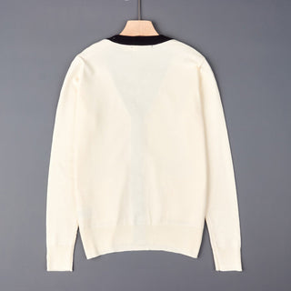 Cardigan crème, dos uni avec col V bordé contrasté