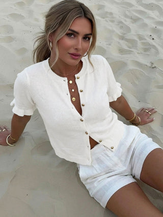 Cardigan tricot blanc à manches courtes, boutonné devant, encolure ronde
