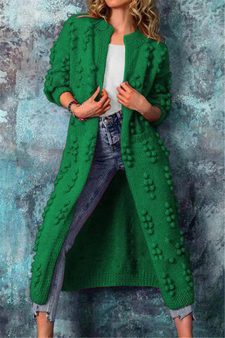 Cardigan long ouvert en tricot texturé vert, motifs en relief sur l’avant, manches 3/4