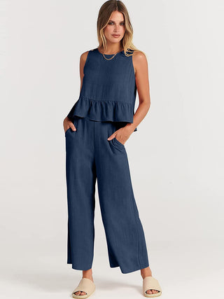 Ensemble blouse sans manches volant bleu et pantalon large, silhouette ample