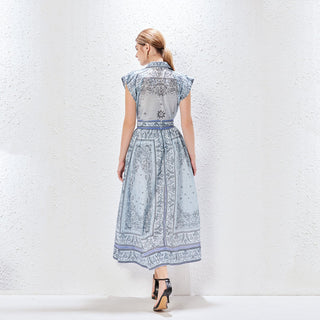 Ensemble blouse et jupe imprimées bleu, dos évasé, ceinture à la taille, imprimé.